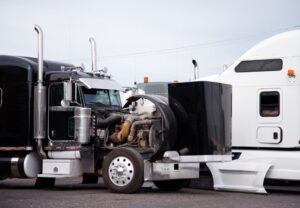 Big rig truck crashing with another semi truck