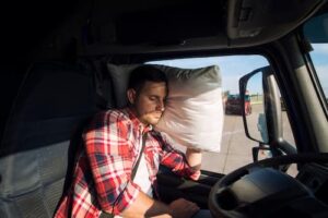 Truck Driver tired and sleeping