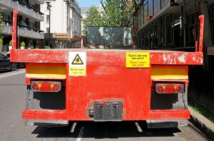 parked truck with blind spot safety stickers